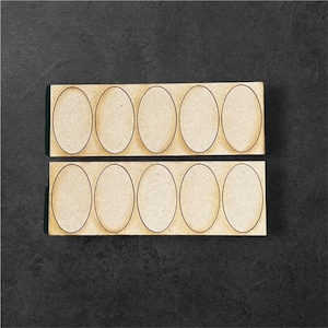 Paar ovale bewegingstrays van 35 x 60 mm (figuur 5) lineair MDF