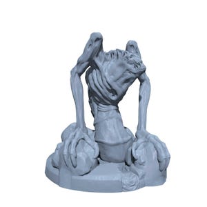 May include: A gray, stylized figurine of a creature with a skeletal torso, long arms, and large hands. The creature has a menacing expression and is posed on a rocky base. The figurine is likely for tabletop gaming or display.