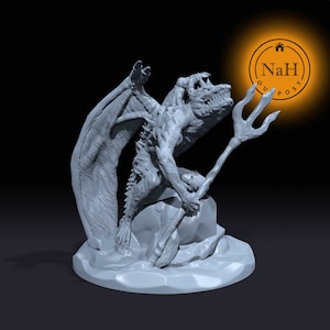 May include: A gray 3D printed miniature of a dragon-like creature with wings, holding a trident, perched on a rock. The miniature is set on a circular base.