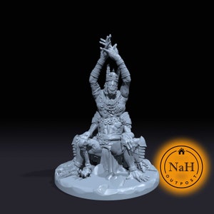 May include: A gray, detailed figurine of a seated monster with raised arms. The monster wears a crown and armor, with intricate detailing on its body. The figurine is on a rocky base, with the NaH Outpost logo in the lower right corner.