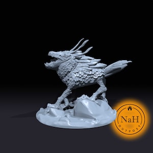 May include: A gray 3D printed miniature of a mythical creature with feathered wings and a sharp beak, standing on a rocky base.