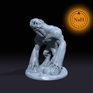 May include: A gray 3D printed miniature of a monstrous creature with a large head and long arms. The creature has a gaping mouth and sharp claws. The miniature is posed in a standing position, with its head tilted back and its arms outstretched.