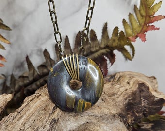 Fer tigre, forme de beignet, enveloppe en laiton, chaîne pour trombone, collier