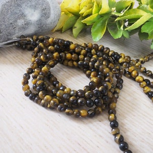 120-Kugeln 6mm Natur Tiger Auge - Neun - Versand angeboten