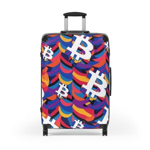 May include: A black suitcase with a colorful pattern of Bitcoin symbols. The suitcase has a retractable handle and four wheels.