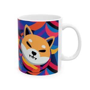 May include: White ceramic mug with a colorful abstract design featuring a cartoon Shiba Inu dog with a blue, red, orange, yellow, and purple background.