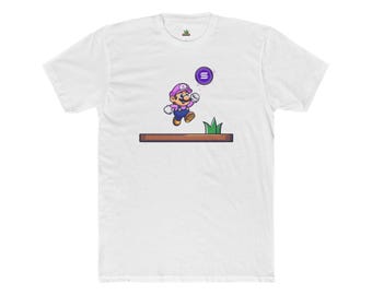 May include: White t-shirt featuring a cartoon character in a purple hat and overalls jumping over a brown platform. The character is reaching for a purple coin with a white symbol. Green grass is visible.