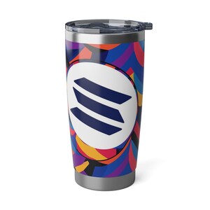 May include: A stainless steel tumbler with a colorful abstract design and a blue logo in a white circle. The tumbler has a lid with a blue silicone seal.