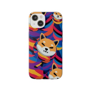 May include: A white iPhone case with a colorful abstract design featuring multiple Shiba Inu dog faces. The design is a mix of blue, purple, red, yellow, and orange.