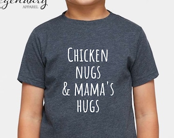 May include: A dark blue t-shirt with white text that reads "Chicken Nugs & Mama's Hugs".