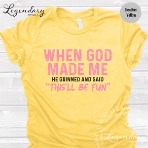 a yellow t-shirt with a humorous text printed on it.