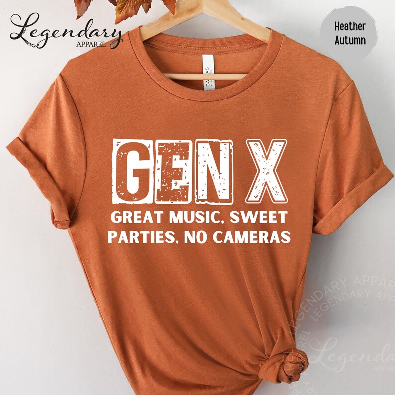 a red t-shirt with the text "GENX" printed on it, along with the text "GREAT MUSIC. SWEET PARTIES. NO CAMERAS" below it.