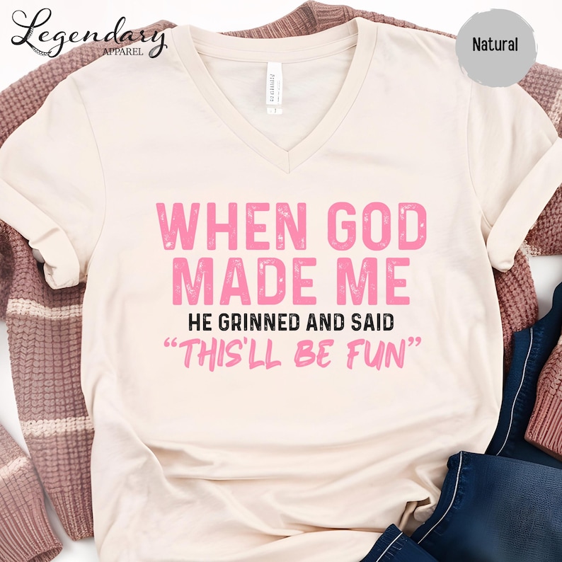 a white t-shirt with a humorous text printed on it.
