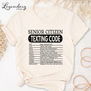 a white t-shirt with a list of text and a list of numbers printed on it. The text and numbers are arranged in a way that they are easy to read and understand.