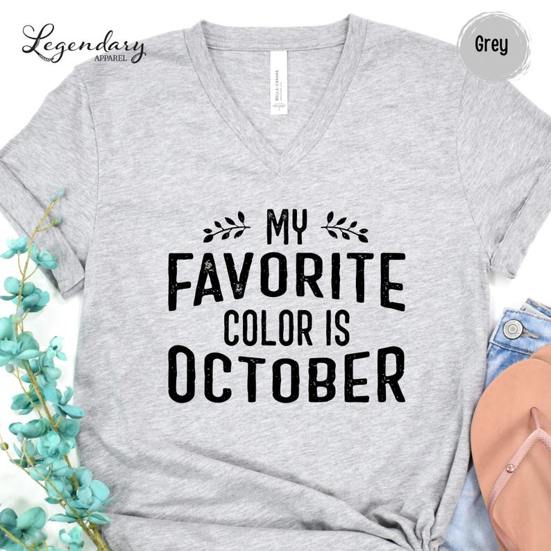 a grey t-shirt with the text "My Favorite Color Is October" printed on it.