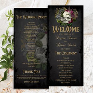 May include: Black and gold wedding ceremony program with a skull and floral design. The program includes the wedding party, ceremony details, and a thank you message from the couple.