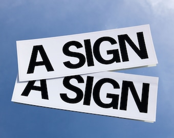 A Sign – Bumper Sticker Car Decal 3x10