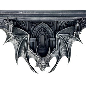 May include: A wall-mounted shelf featuring a dark gray, metallic finish with intricate gothic architectural details. The design includes a central dragon head with large, spread wings that form the support brackets, and arched window motifs.