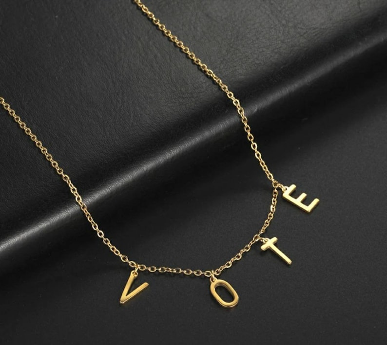 2020 Cazador Former First Lady Of The US Michelle Obama Wears The Same VOTE Necklace Jewelry Freedom Equality Stainless Steel 41 CM