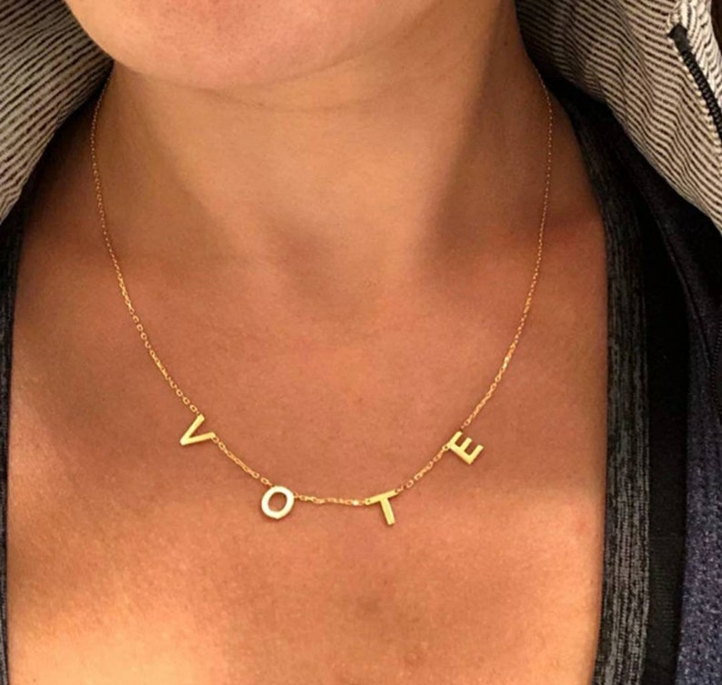 2020 Cazador Former First Lady Of The US Michelle Obama Wears The Same VOTE Necklace Jewelry Freedom Equality Stainless Steel 41 CM