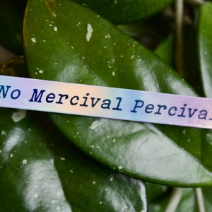 No Mercy Percy // Papel Crítico // Adesivo Holográfico