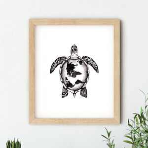 May include: A framed black and white illustration of a turtle with the world map inside its shell.