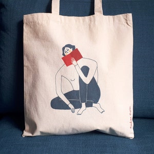 Sac en coton tote bag illustré Femme et livre