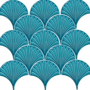 May include: Teal blue ceramic tiles in a fan shape pattern. The tiles are arranged in a staggered pattern, creating a unique and stylish design.