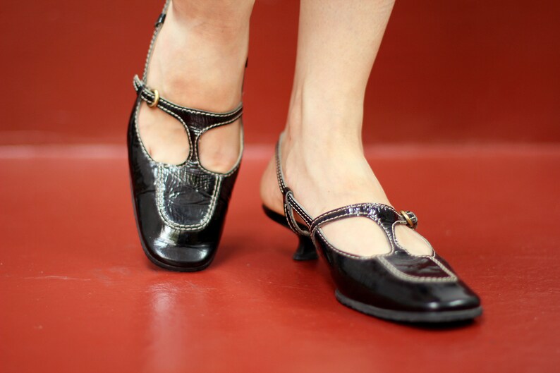 black patent leather kitten heels