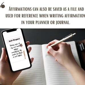 May include: A smartphone displaying an affirmation about self-regard. The text reads "Taking care of my own needs before considering the needs of others is not selfish." The phone is being held by a person's hand, and the person is writing in a journal with a pen.