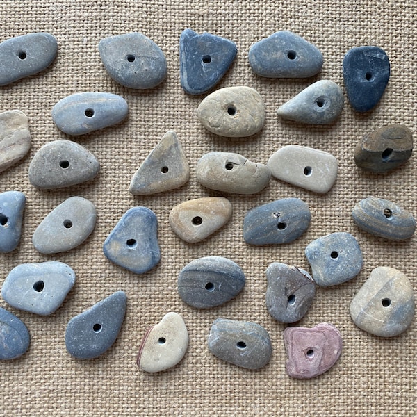 30x medium (~1”inch) flat, smooth stones with middle drilled holes (~3mm)