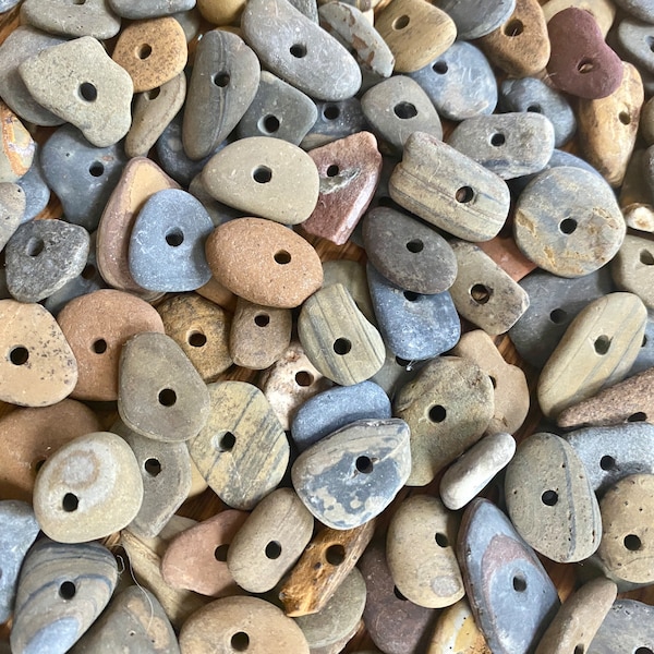 50x small (1/2”- 1”inch) flat, smooth stones with middle drilled holes (~3mm)