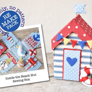 May include: A red and blue beach hut sewing box with a white polka dot roof and a blue heart on the door. The box is open and the inside is filled with sewing supplies. The box is labelled "Inside the Beach Hut Sewing Box".