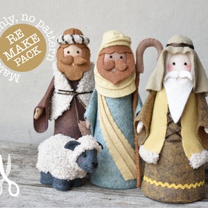 May include: Three felt figures of shepherds, one with a staff and a sheep, with the text "Materials only, no pattern RE MAKE PACK" in a circle.
