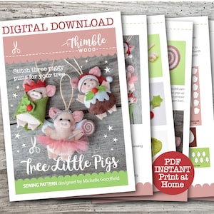 May include: A digital download sewing pattern for "Tree Little Pigs" ornaments. The cover features three pig ornaments with festive outfits. The pattern includes SVG files and instructions for creating the ornaments.