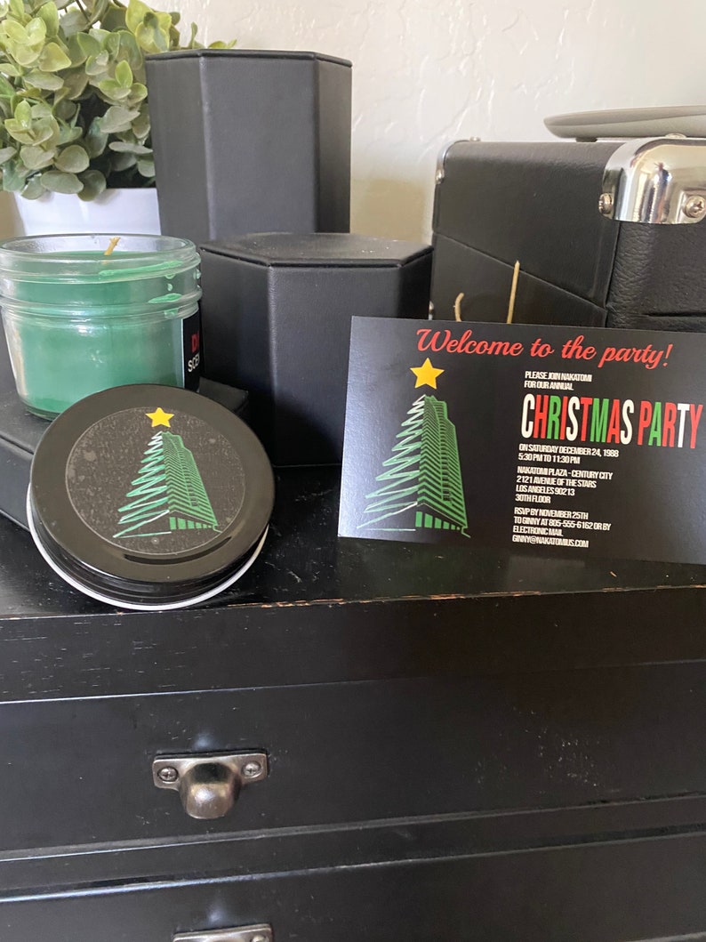 May include: A black and green Christmas party invitation with a stylized Christmas tree and the text "Welcome to the party!" and "Christmas Party".