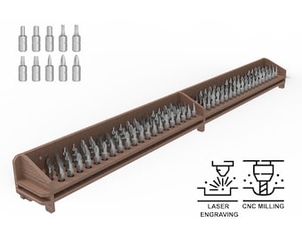 May include: A wooden wall-mounted organiser with two rows of slots for holding screwdriver bits. The organiser is made of brown wood and has a natural finish. The slots are arranged in a staggered pattern. The organiser is labelled "Laser Engraving" and "CNC Milling".