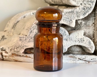 Brown / dark amber apothecary jar, made in Belgium | Measures: 7" tall with stopper