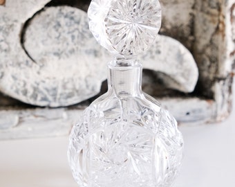 Vintage cut crystal perfume decanter with stopper