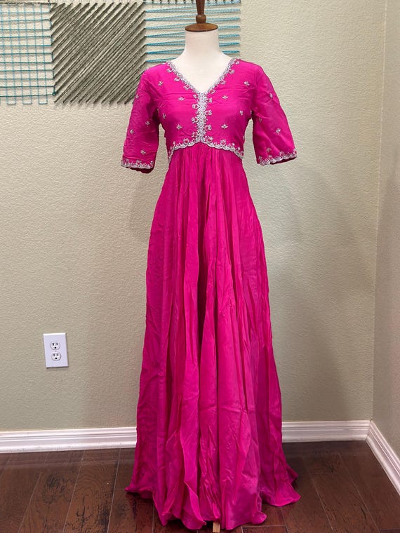 pink dress for haldi Top 8 Haldi Outfits That Are Not Yellow -Weva Photography