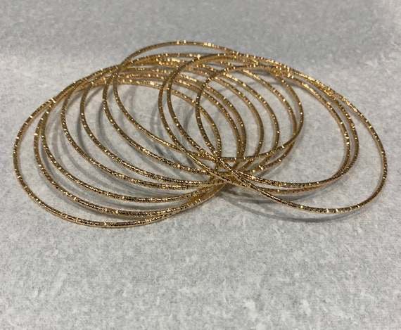 Superb French Gold Plated Set Of Ten Bangles. - image 1