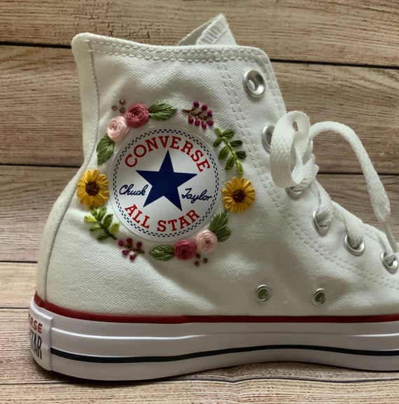 white embroidered converse