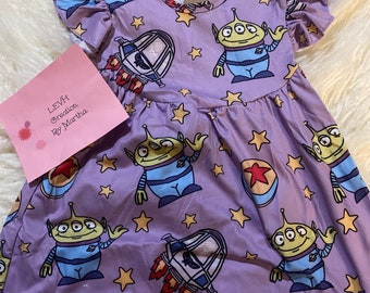 Purple Toy Alien Character Inspired Flutter Sleeve Milk Dress