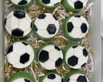 Soccer themed Oreo cookies , football soccer cookies decorated with fondant.