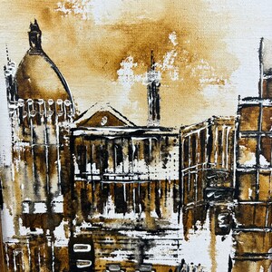 May include: A painting of a city scene in shades of brown, black, and white. The painting features a tall building with a dome on top, and several other buildings in the background. The painting is signed "Marcelle" in the bottom right corner.