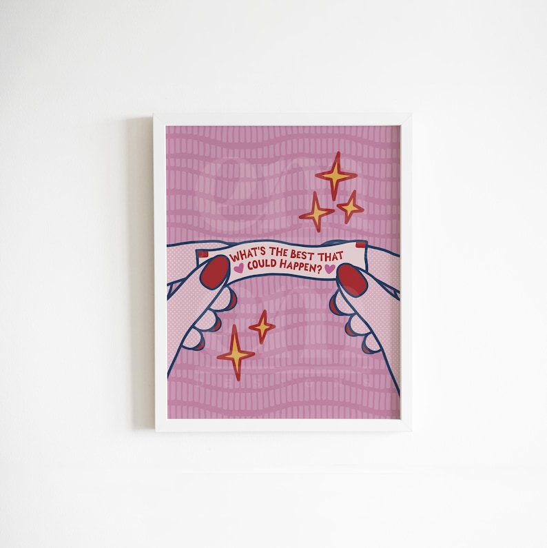 Peut inclure: Une affiche encadr&eacute;e repr&eacute;sentant un message de biscuit chinois. L'impression montre des mains tenant une fortune avec le texte "WHAT'S THE BEST THAT COULD HAPPEN?" sur un fond rose ondul&eacute;, avec des &eacute;toiles.
