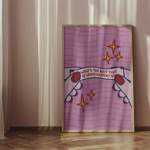 Peut inclure: Une affiche encadr&eacute;e avec un fond rose &agrave; rayures verticales. L'&oelig;uvre d'art repr&eacute;sente des mains de dessin anim&eacute; tenant une banni&egrave;re avec le texte "WHAT'S THE BEST THAT COULD HAPPEN ?" et des &eacute;toiles. L'affiche est appuy&eacute;e contre un mur.