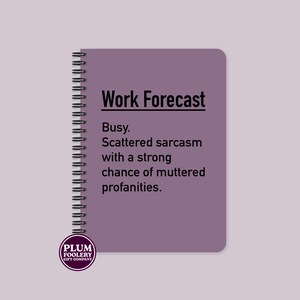 May include: A purple spiral bound notebook with the text "Work Forecast" and the text "Busy. Scattered sarcasm with a strong chance of muttered profanities."  The notebook has a sticker with the text "Plum Foolery Gift Company".