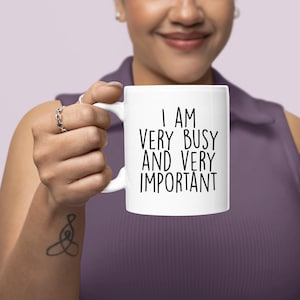 Funny office mug featuring I Am Very Busy And Very Important quote on white ceramic mug