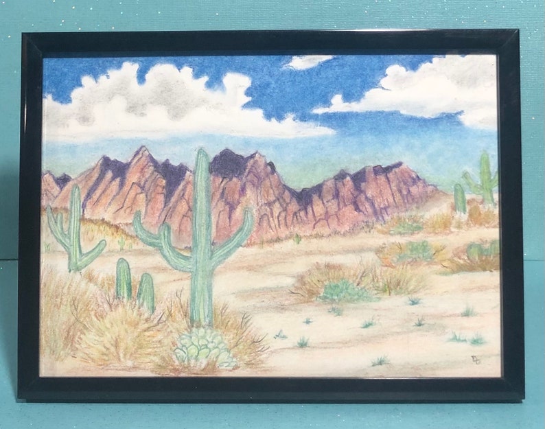 May include: A watercolor painting of a desert landscape with mountains in the background and a large cactus in the foreground. The sky is blue with white clouds. The mountains are a reddish-purple color. The cactus is green and has many arms. The ground is a light brown color.